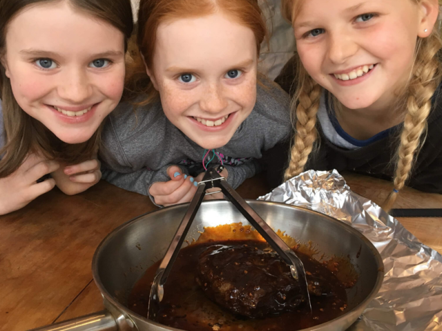 School age children learn to cook skirt steak.