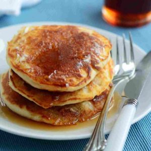 Stack of 3 buttermilk pancakes with maple syrup
