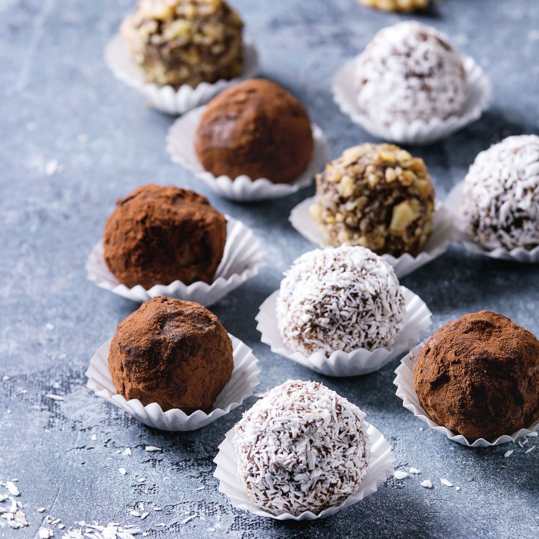 dark chocolate truffles rolled in cocoa, coconut and nuts